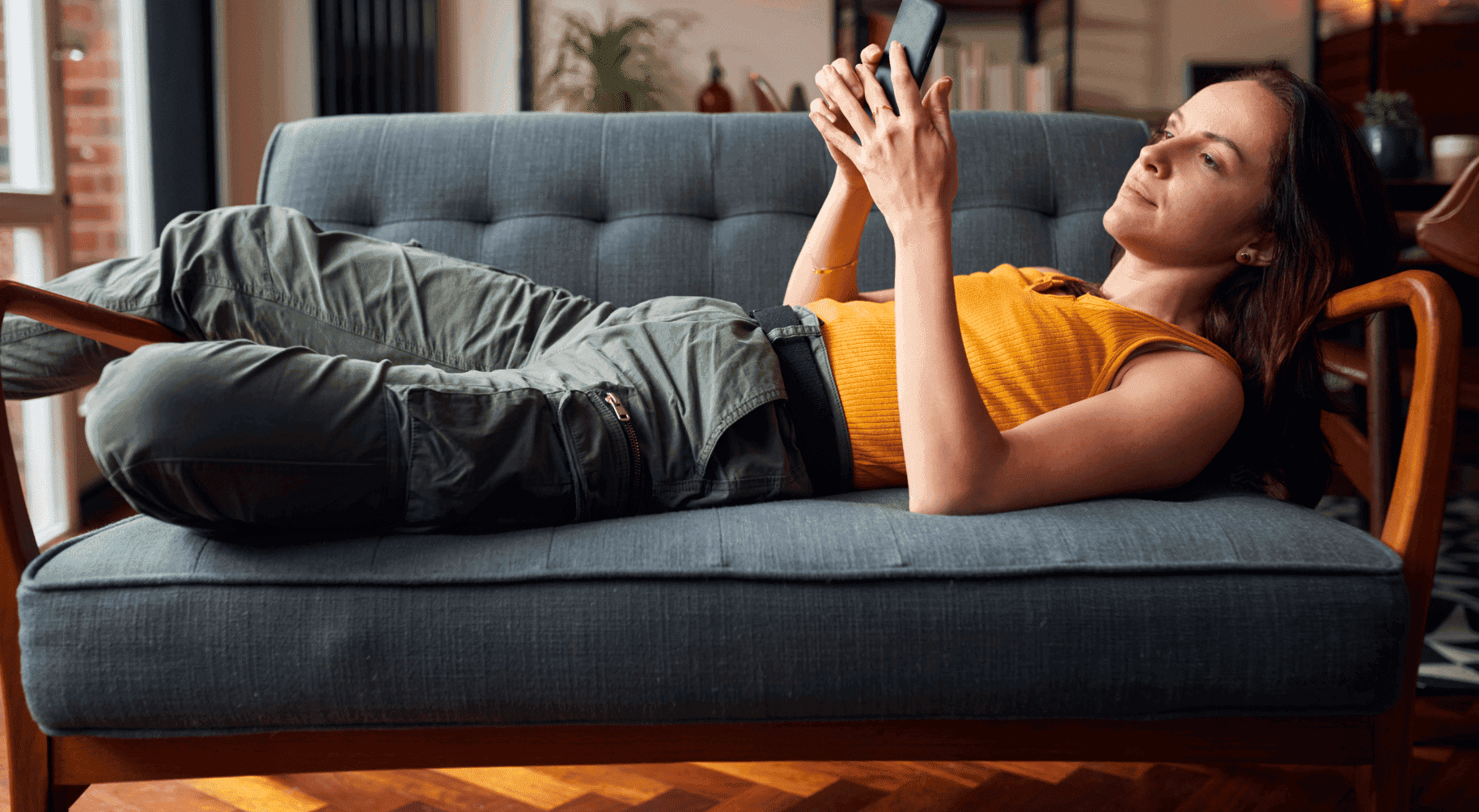 Girl on couch with phone